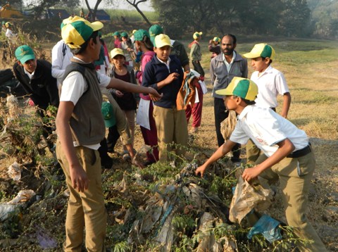 Riverbank cleaning  with School Students